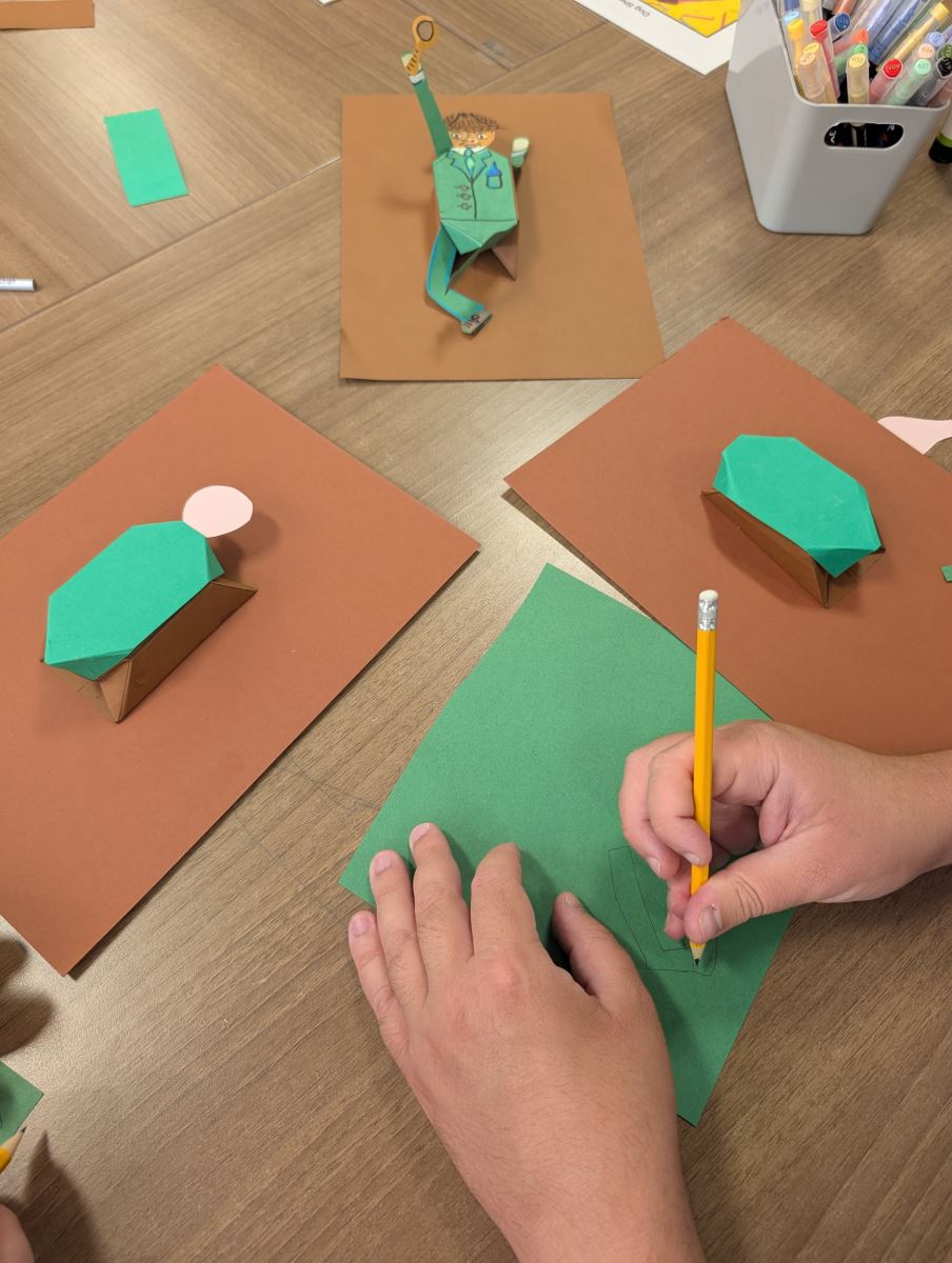 A photo showing the process of making a paper detective